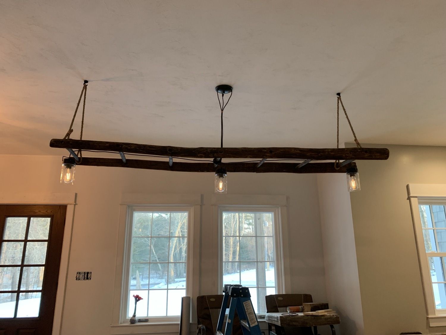 Custom beam chandelier with three pendant lights