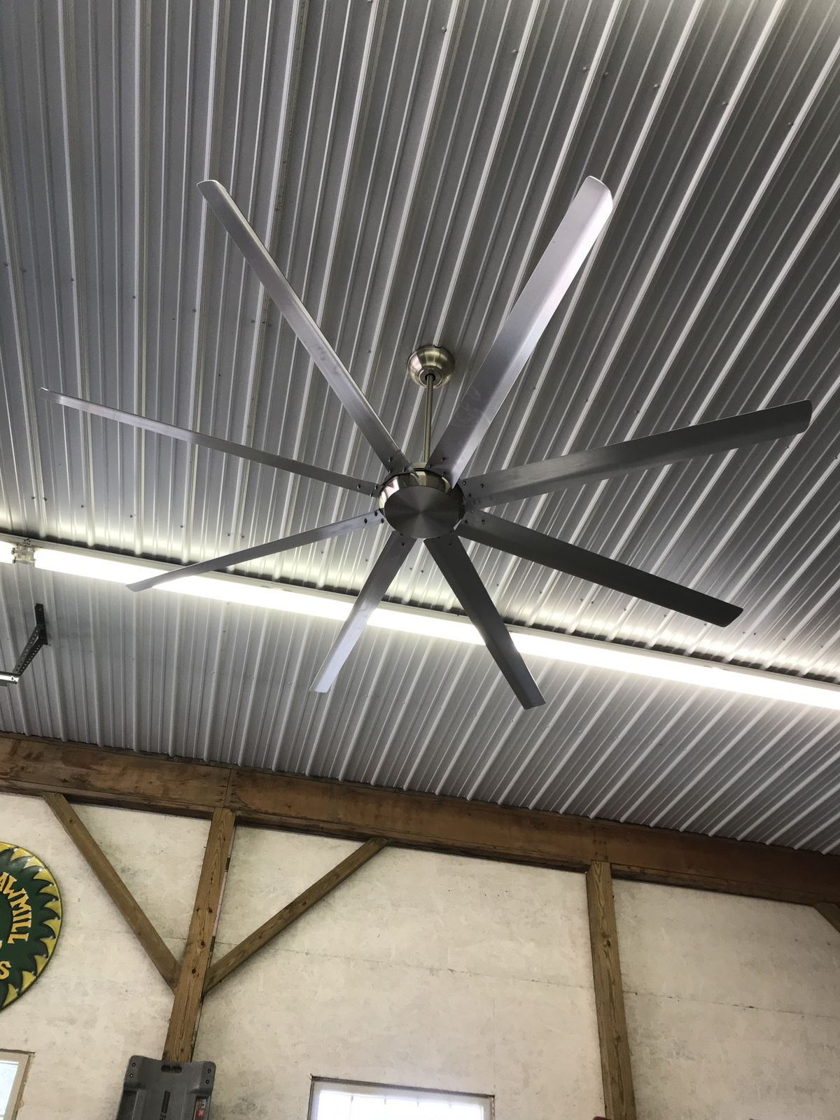 High-volume ceiling fan on a shop metal ceiling