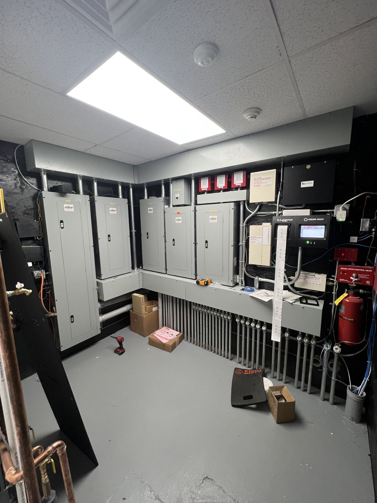 Service station electrical room, panels, and tank monitor
